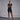 Femme portant une combinaison sauna NaRsKo noire et bleue à manches courtes pour le fitness et la perte de poids