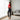 Legging NaRsKo taille haute noir effet push-up pour femme, porté par une femme dans un salon lumineux.