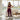 Legging de sport NaRsKo bordeaux sans couture avec bandes latérales blanches, porté par une femme dans un salon lumineux