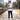 Studio photo of CEINTURE A LOMBAIRES PRO MUSCULATIONS Back view with head turned to show profile, full body rear shot showing garment details from behind. CAMERA SHOT: A FULL BODY shot capturing the person from head to toe. [Full body]
